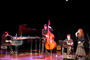 Paula Monsalve singer songwriter performing at the Arts Place in Portland, Indiana from Linares Chile